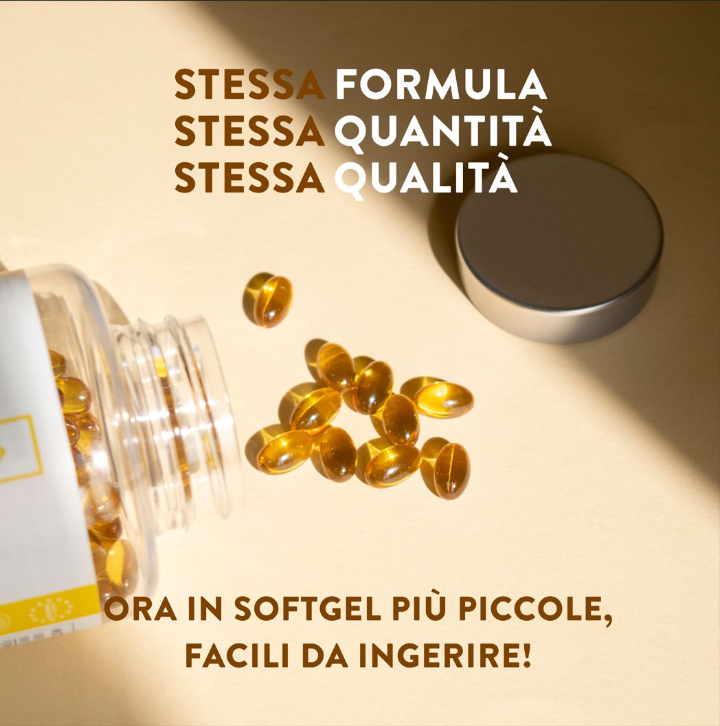 Capsule di vitamina D3 su una superficie. Scritta: Stessa formula, stessa quantità, stessa qualità.