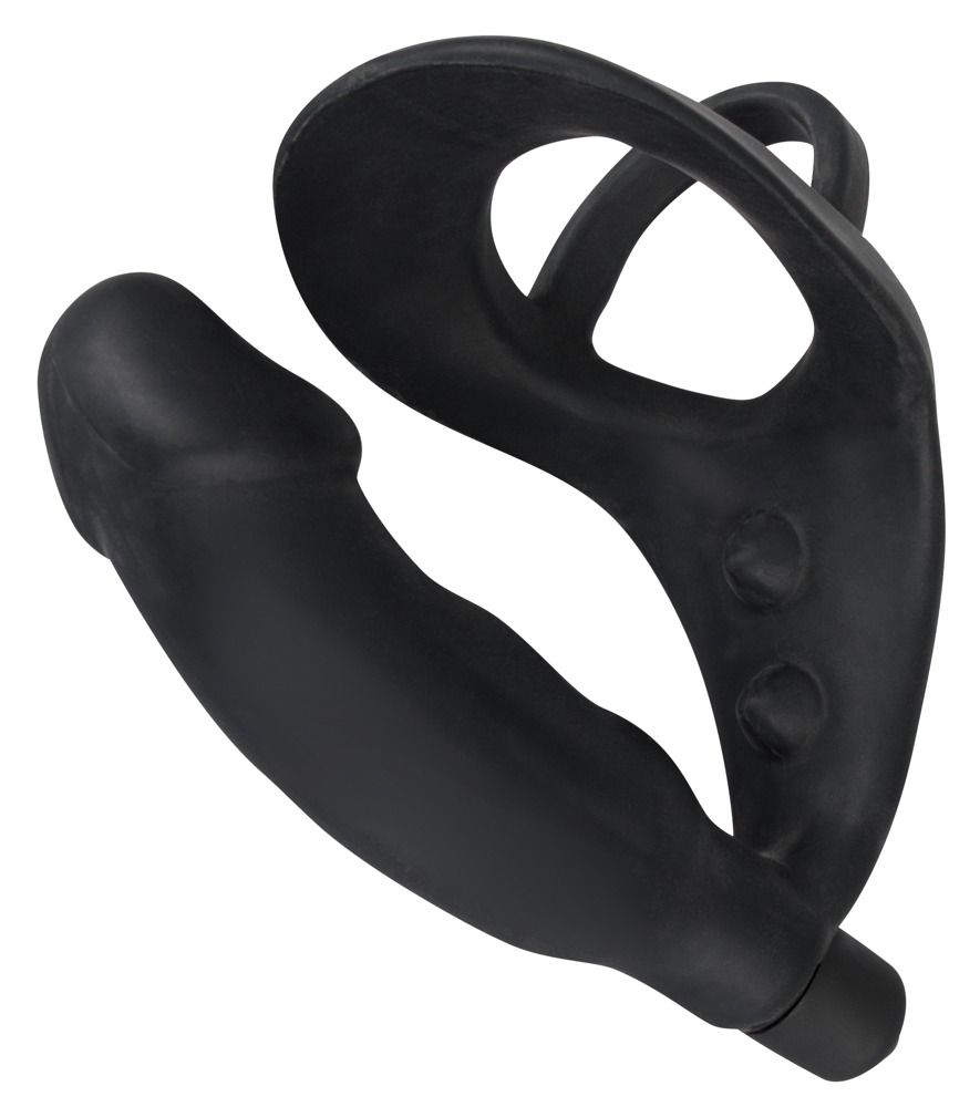 Anello per pene/scroto nero con plug anale. Parte ad anello, asta curva con forma di pene, plug anale all'estremità. Silicone.