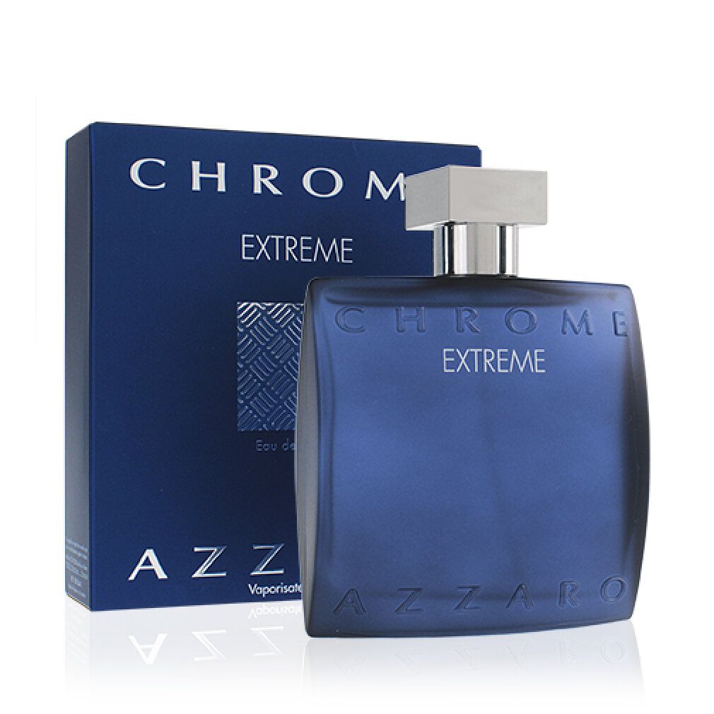 Flacone di profumo blu e scatola. Flacone con tappo argentato. Scritta: Chrome Extreme, Azzaro.