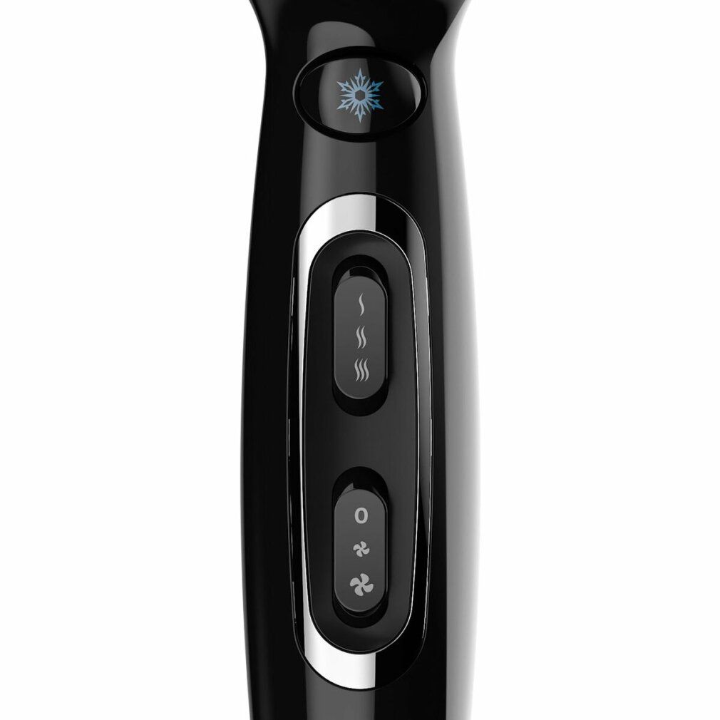 Primo piano dei comandi di un asciugacapelli nero. Impostazioni di temperatura e ventilazione.