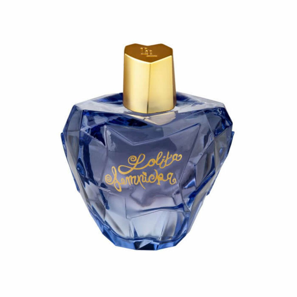 Flacone di profumo blu con tappo dorato. Flacone a forma di cuore con scritta.