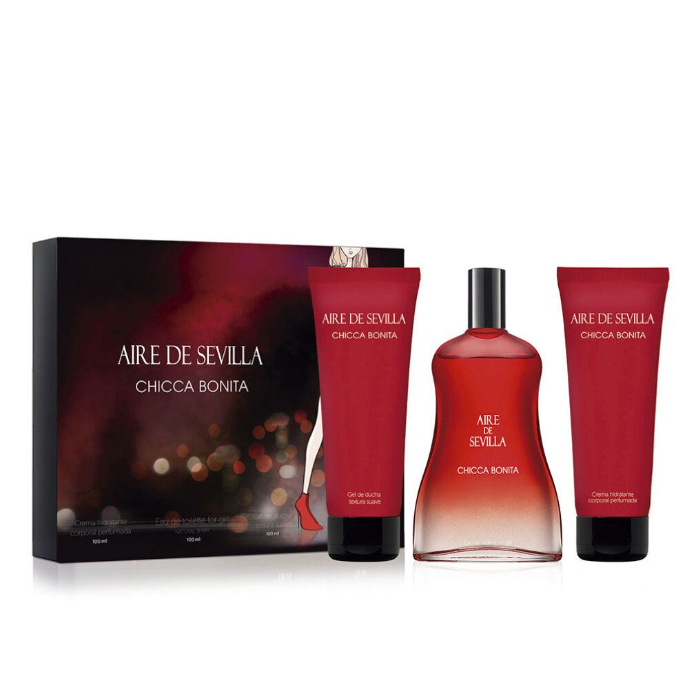 Set regalo con flacone, due tubi e scatola. Liquido rosso nel flacone. Scritta nera: Aire de Sevilla Chicca Bonita.
