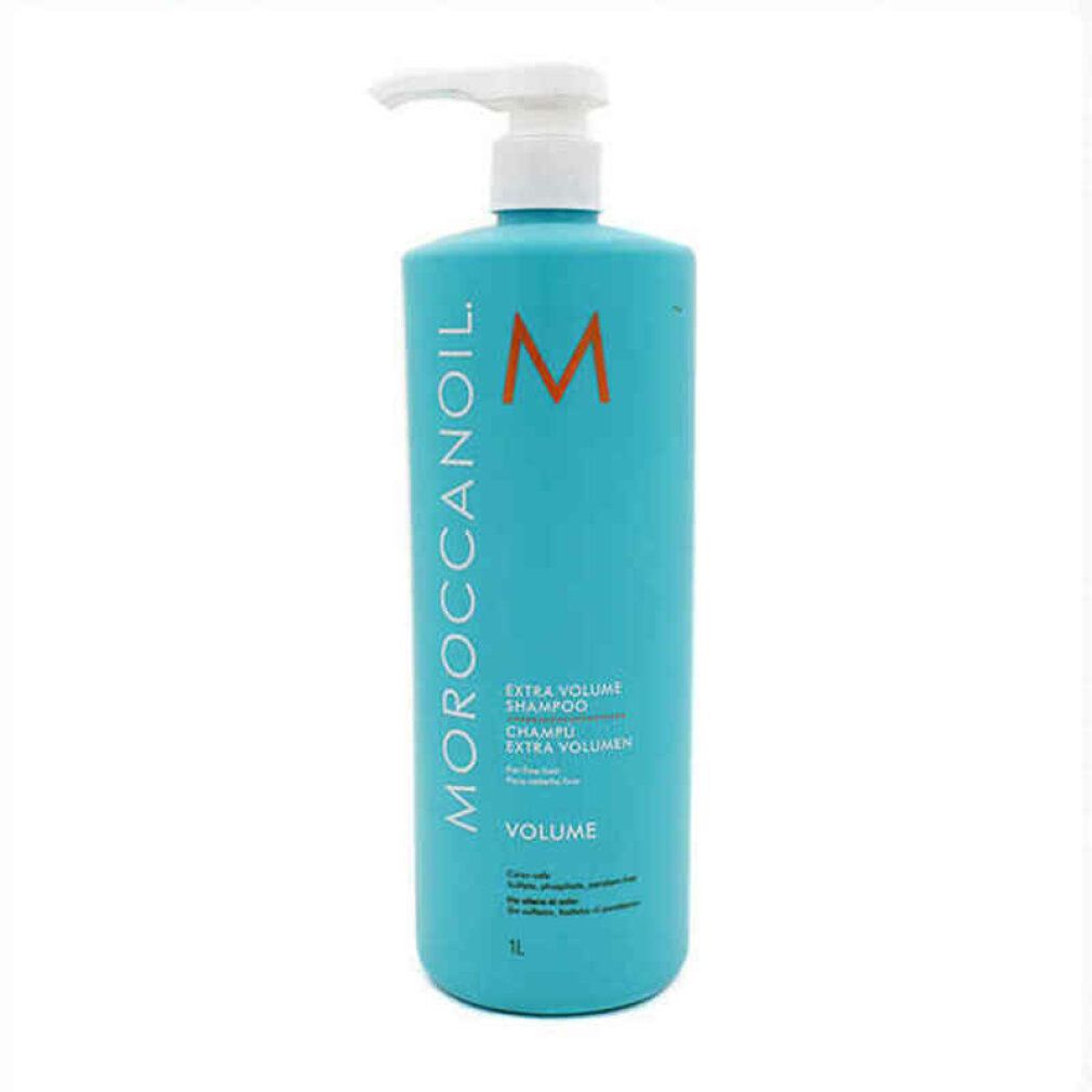 Flacone di shampoo turchese con dosatore bianco. Scritta: Moroccanoil, Volume, Extra Volumen Shampoo.