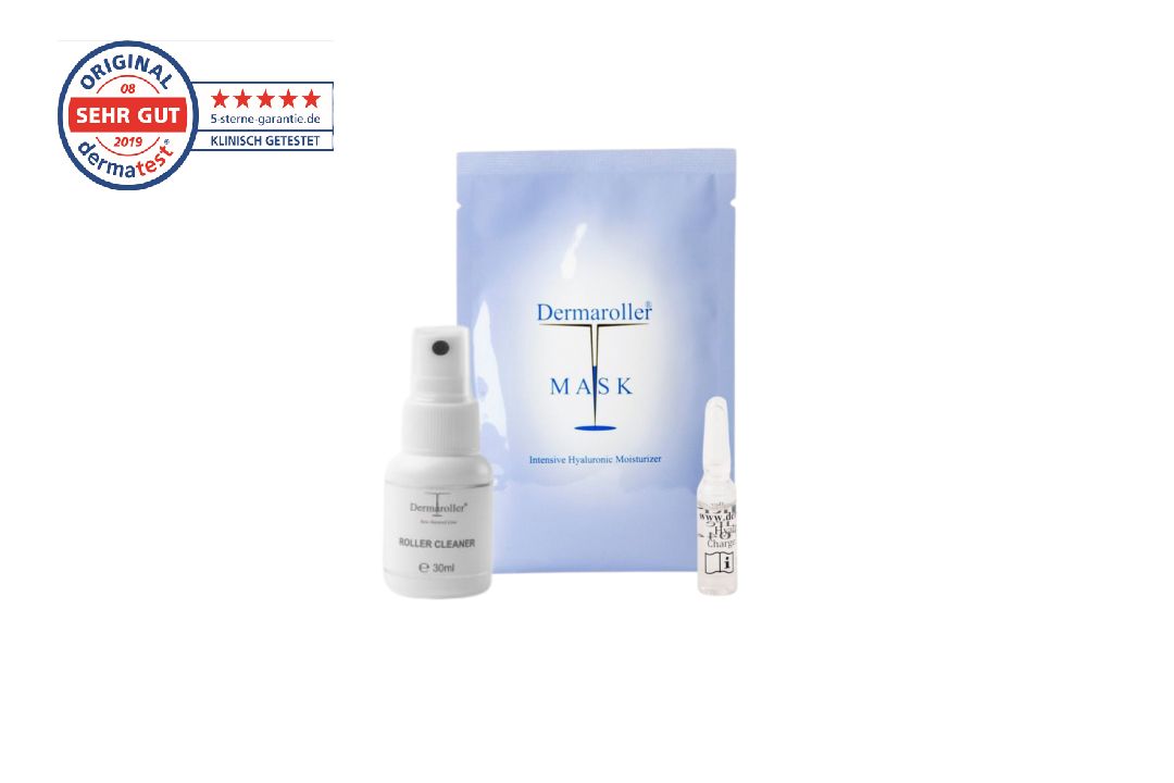 Spray Roller Cleaner, sacchetto maschera Dermaroller e una fiala di acido ialuronico su sfondo bianco.