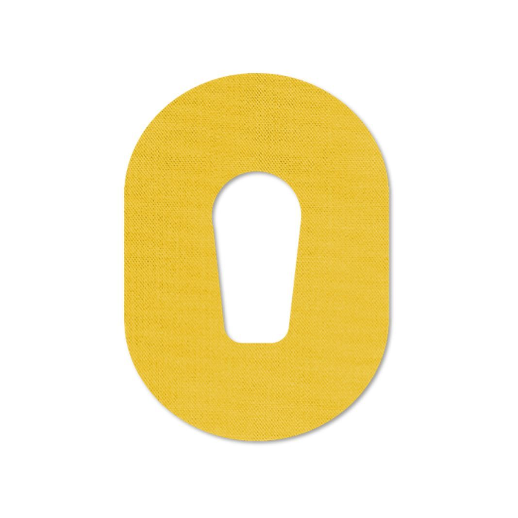 Cerotto ovale giallo con apertura centrale. Materiale a trama fine. Per dispositivi medici.
