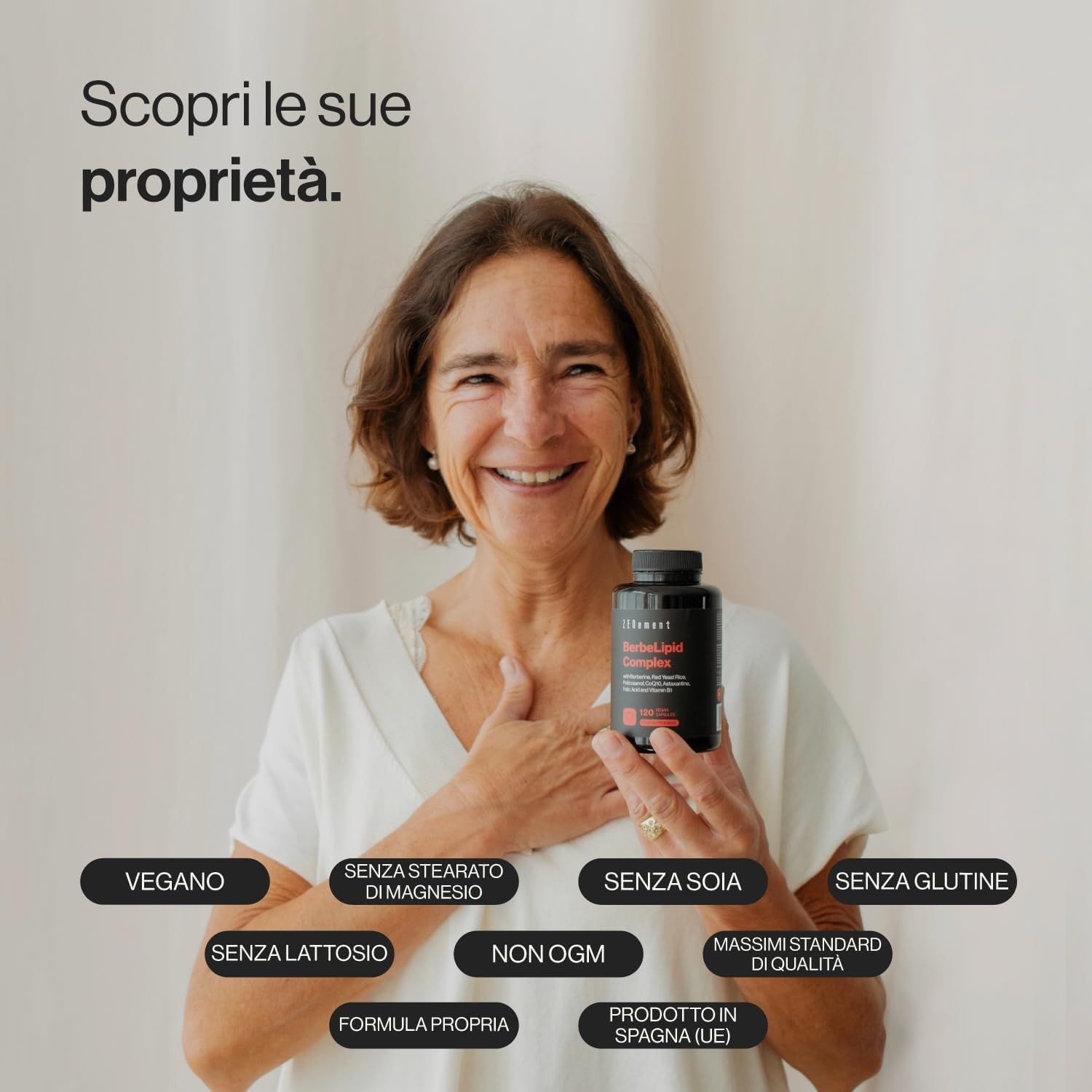 Donna tiene una bottiglia di Zenement BerbeLipid Complex. Bottiglia nera con testo rosso. Vegano, senza soia, senza glutine, prodotto in Spagna.