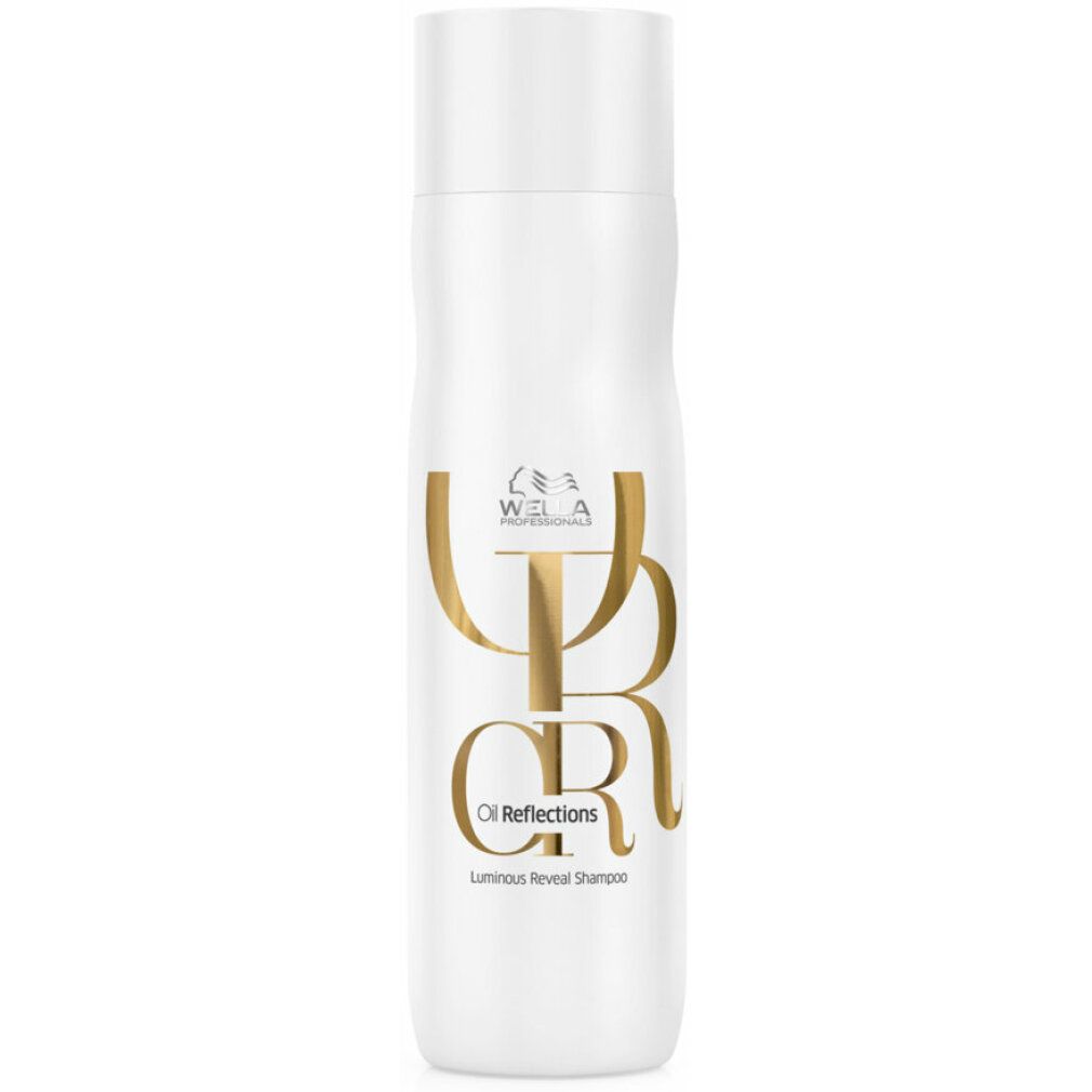 Flacone di shampoo bianco con logo e testo dorati. Scritta: Wella Oil Reflections Luminous Reveal Shampoo.