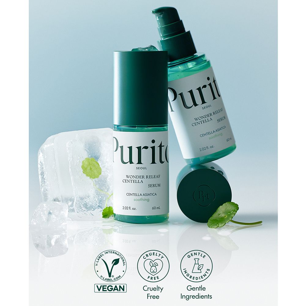 Due flaconi "Purito Wonder Releaf Centella Serum" e foglie verdi. Sigilli Vegan e Cruelty Free.