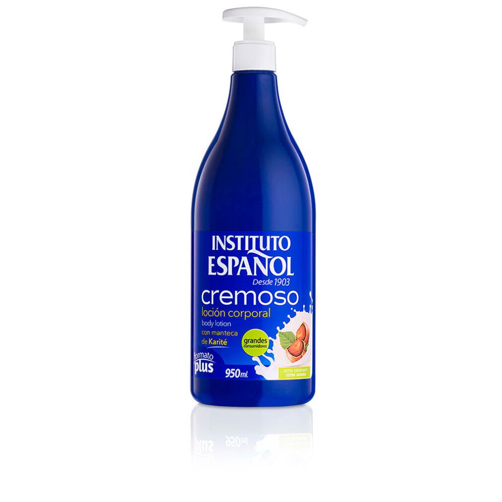 Flacone blu con dosatore. Scritta: Instituto Español, cremoso, loción corporal, 950ml. Illustrazione di frutta.