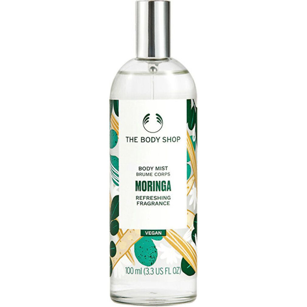Flacone di Body Mist con vaporizzatore. Scritta Moringa, The Body Shop. Decorazioni verdi e gialle.