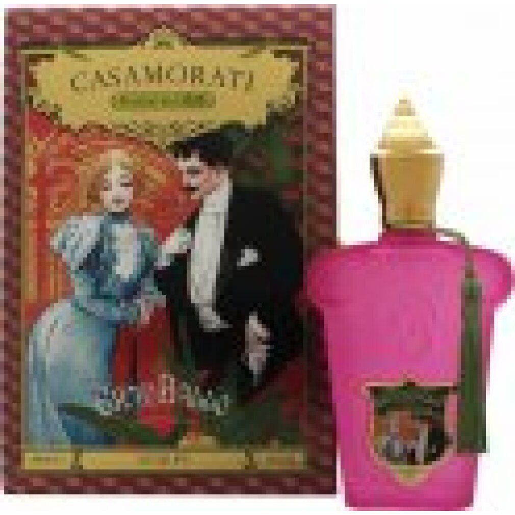 Flacone rosa con tappo dorato e nappa. Confezione con illustrazione di una coppia. Testo: Casamorati, Gran Ballo, Xerjoff.
