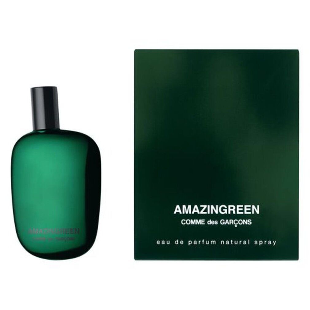 Flacone di profumo verde e scatola verde. Scritta: AMAZINGREEN, COMME des GARÇONS, eau de parfum natural spray.