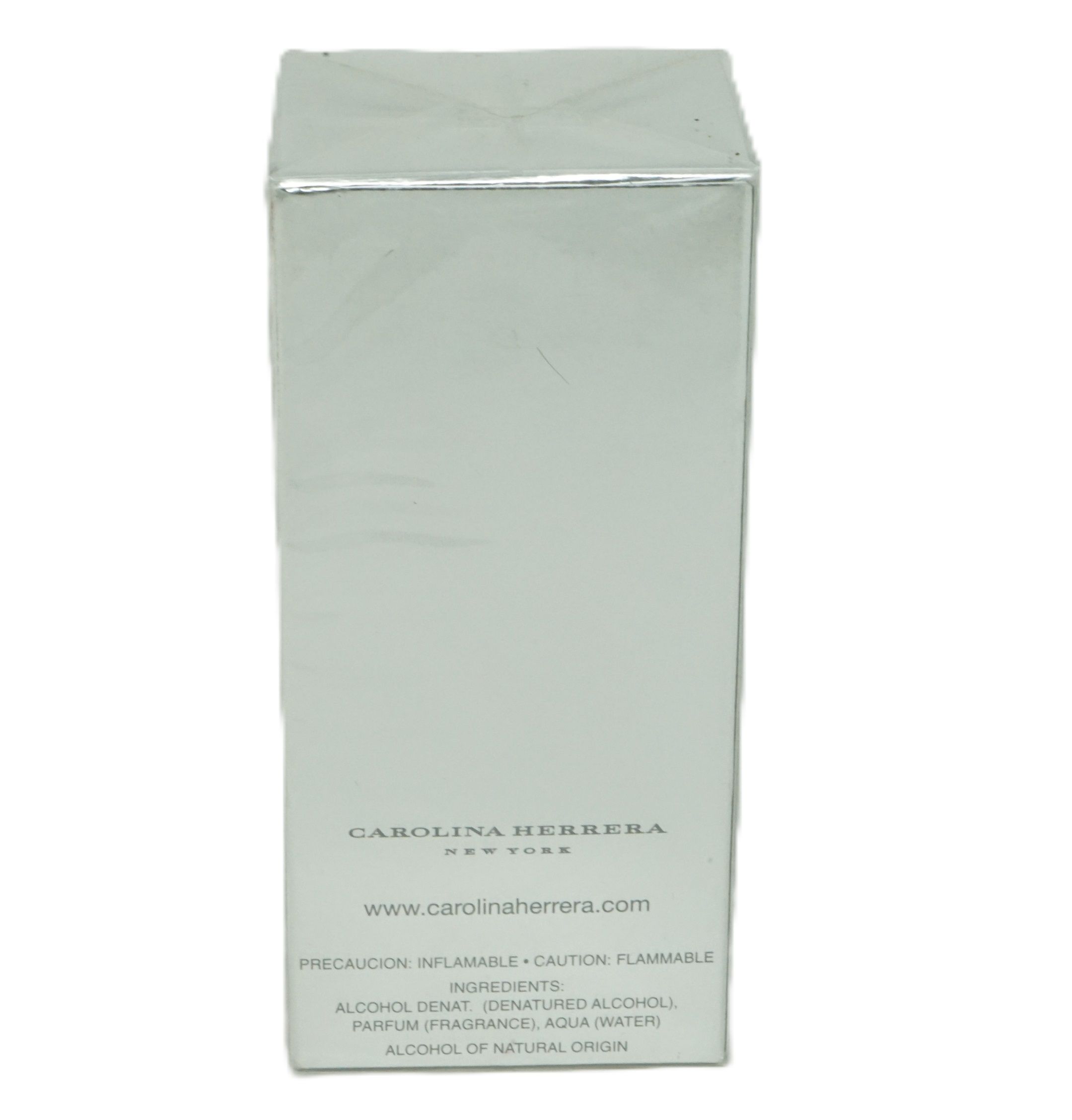 Confezione rettangolare argentata. Scritta: Carolina Herrera New York. Testo: Attenzione, infiammabile. Ingredienti: alcool, acqua.