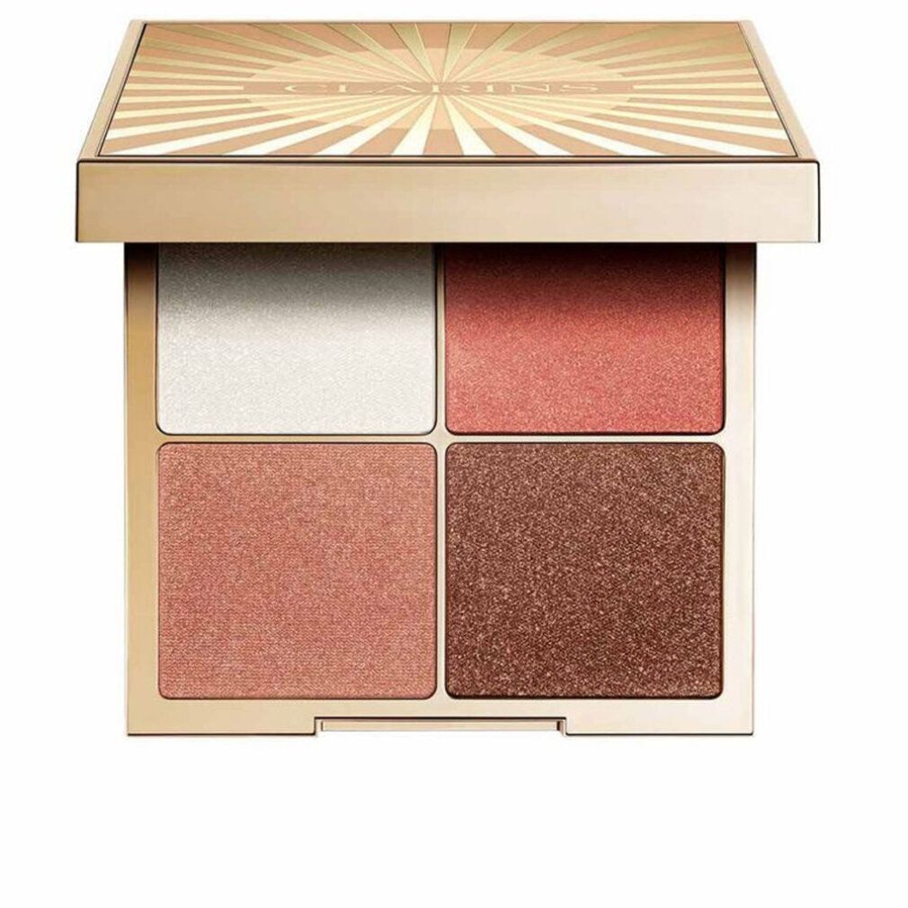 Palette ombretti con quattro tonalità. Confezione dorata con design a raggi solari. Aperta, vista sui colori.