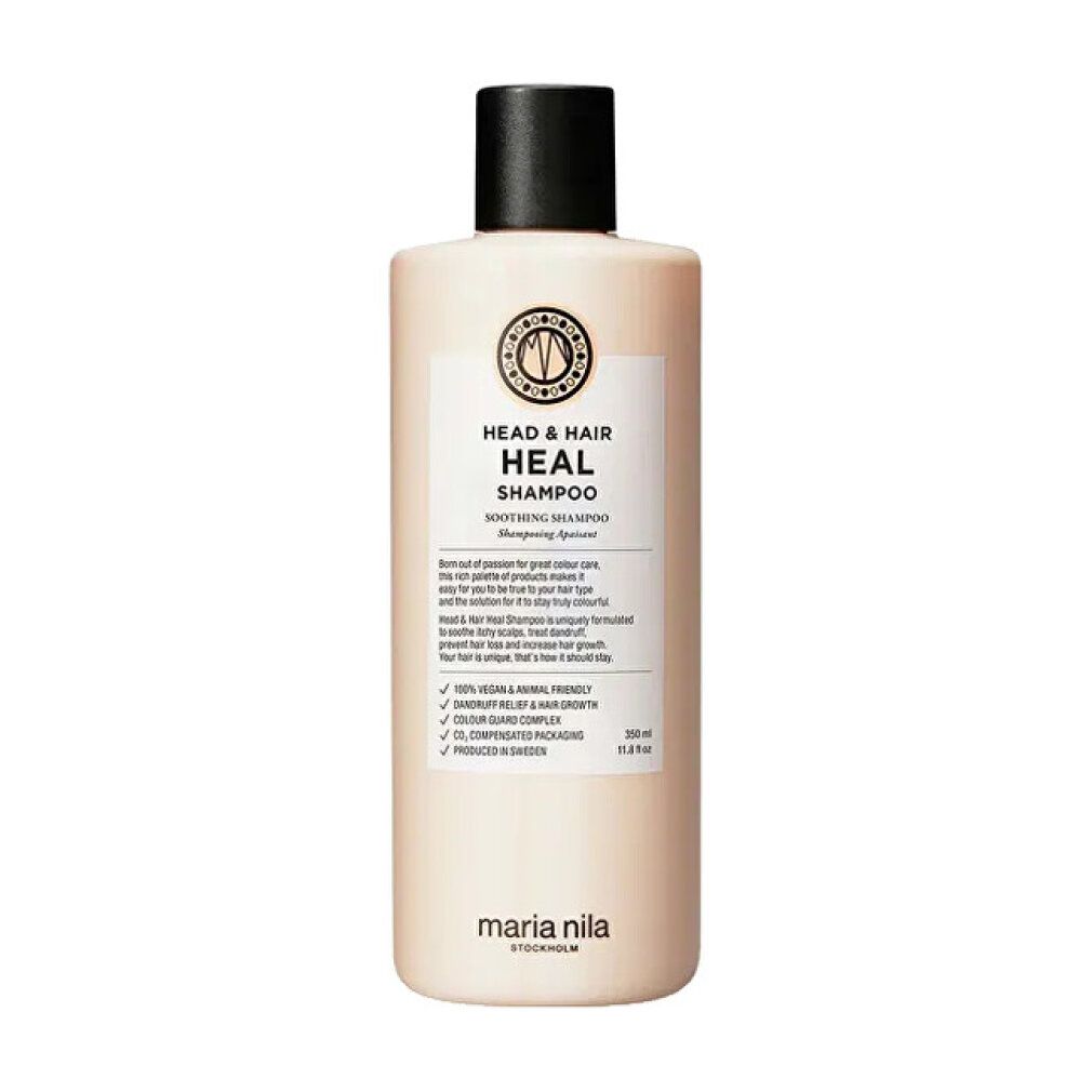 Flacone di shampoo beige con tappo nero. Scritta: HEAD & HAIR HEAL SHAMPOO. Marchio: Maria Nila.