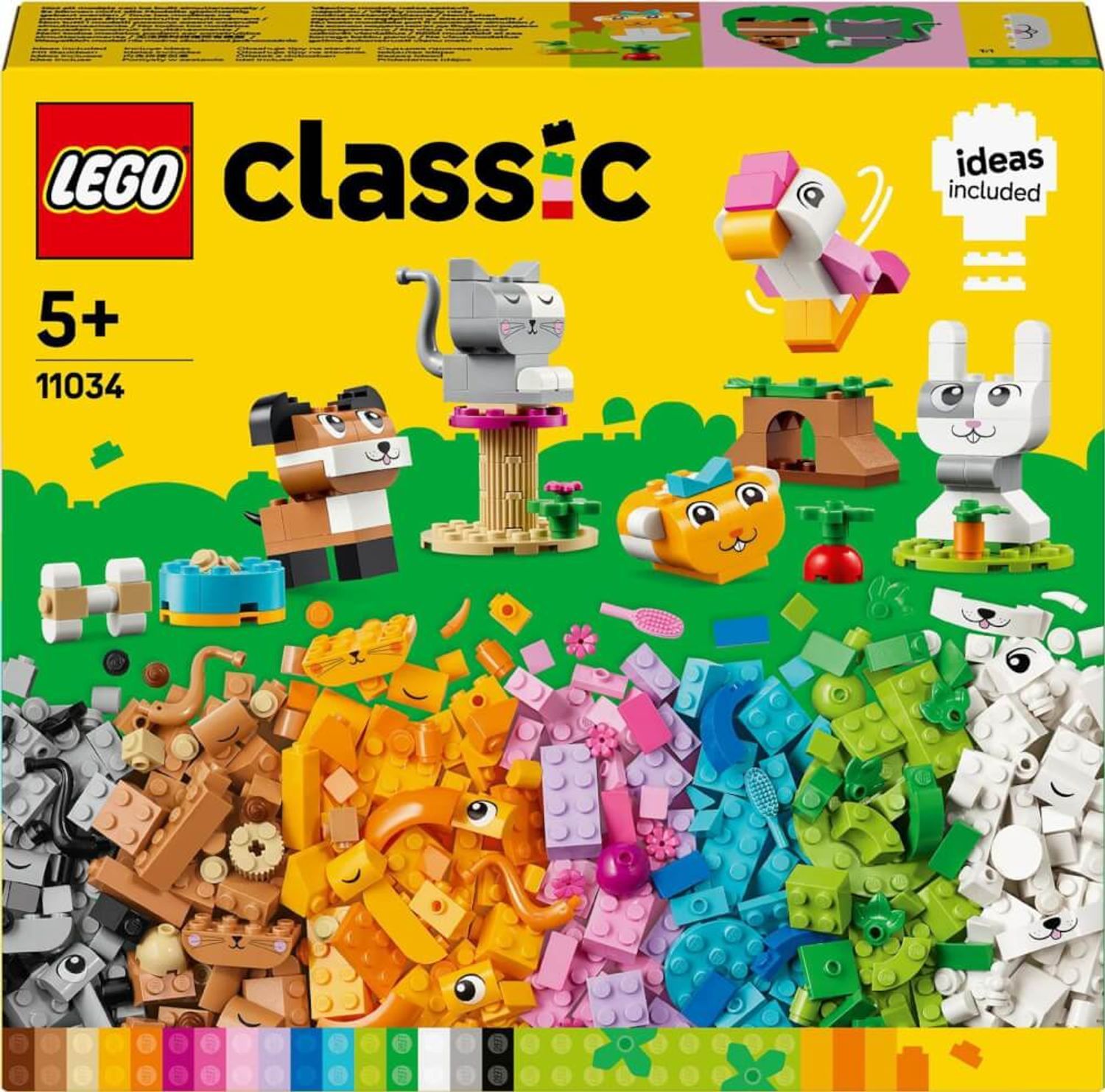 Scatola LEGO Classic gialla con animali costruiti con mattoncini. Volpe, gatto, uccello, coniglio e altri elementi. Idee incluse.