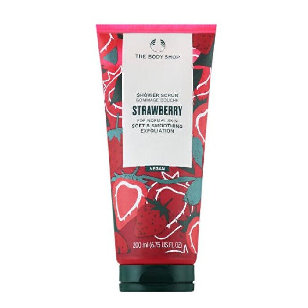 Tubo rosso con motivo a fragole e scritta. Nome del prodotto: Strawberry. Sigillo vegano.