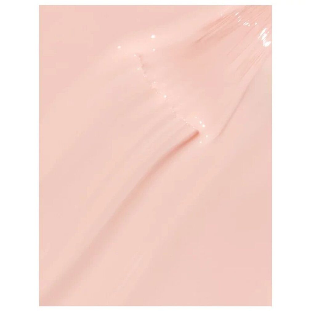Pennellata di smalto rosa chiaro.