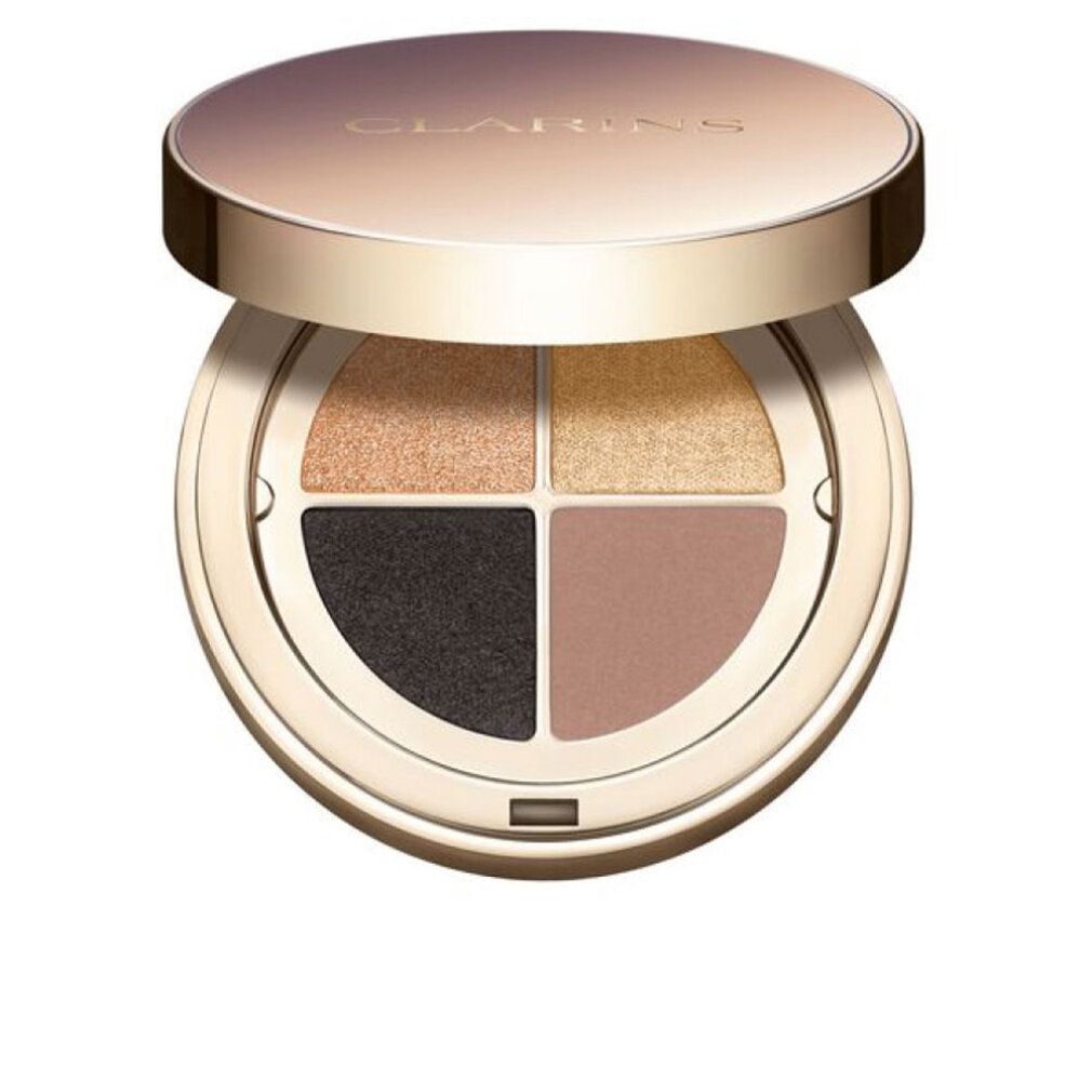 Clarins Ombre 4 Couleurs. Palette rotonda aperta con quattro ombretti: oro, marrone, nero e rosa.
