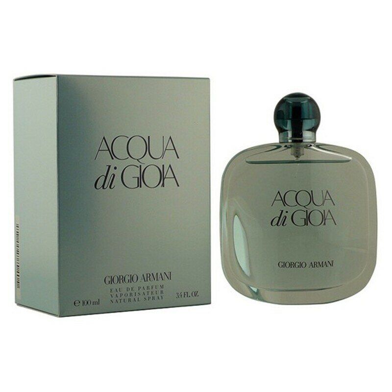 Flacone e confezione di ACQUA di GIOIA. Flacone quadrato, tappo scuro. Scritta: ACQUA di GIOIA, GIORGIO ARMANI. Confezione accanto.