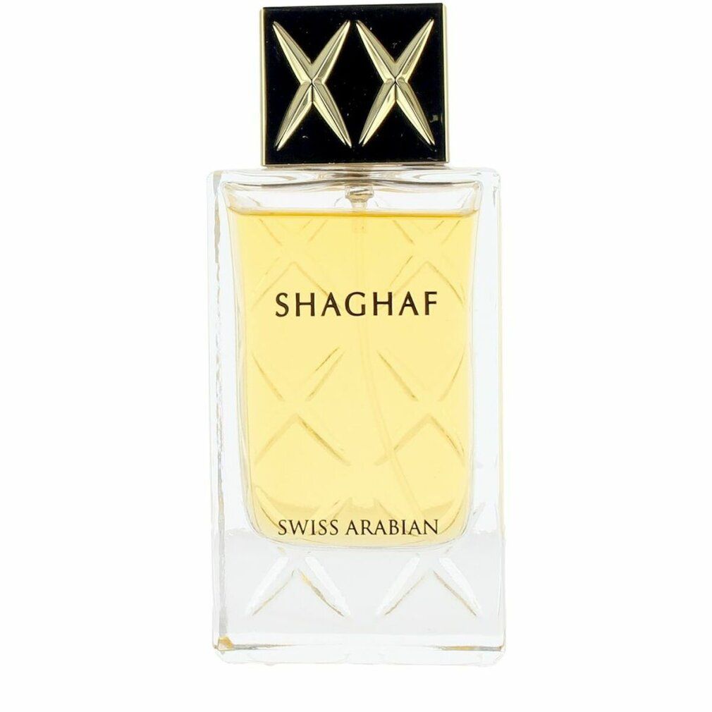 Flacone di profumo con tappo dorato e scritta. Flacone con tappo dorato e forma quadrata.