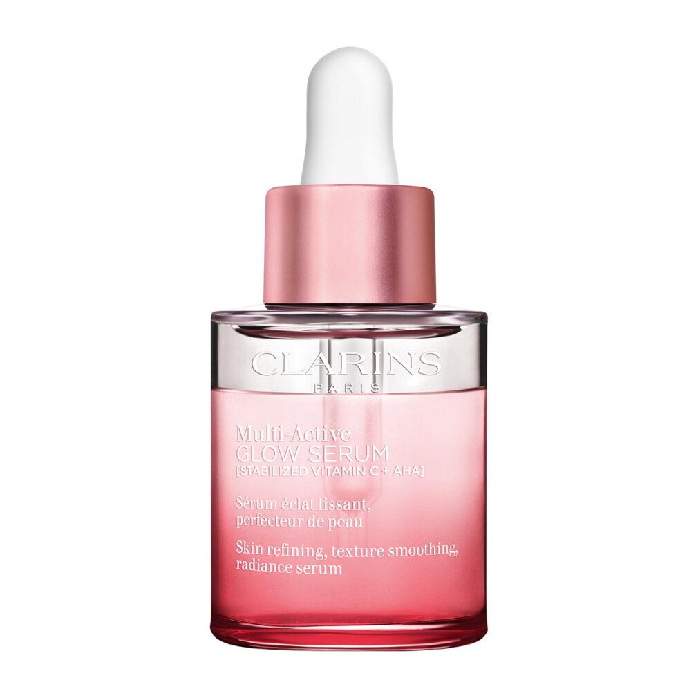 Flacone Clarins Glow Serum con contagocce. Liquido rosa in contenitore di vetro con tappo rosa.