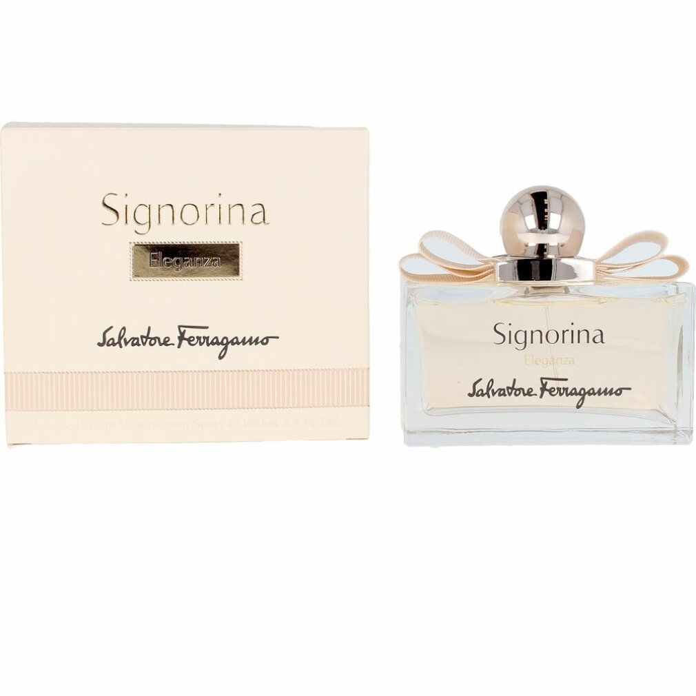 Flacone di profumo con fiocco e tappo. Scritta Signorina Eleganza e Salvatore Ferragamo. Forma rettangolare.