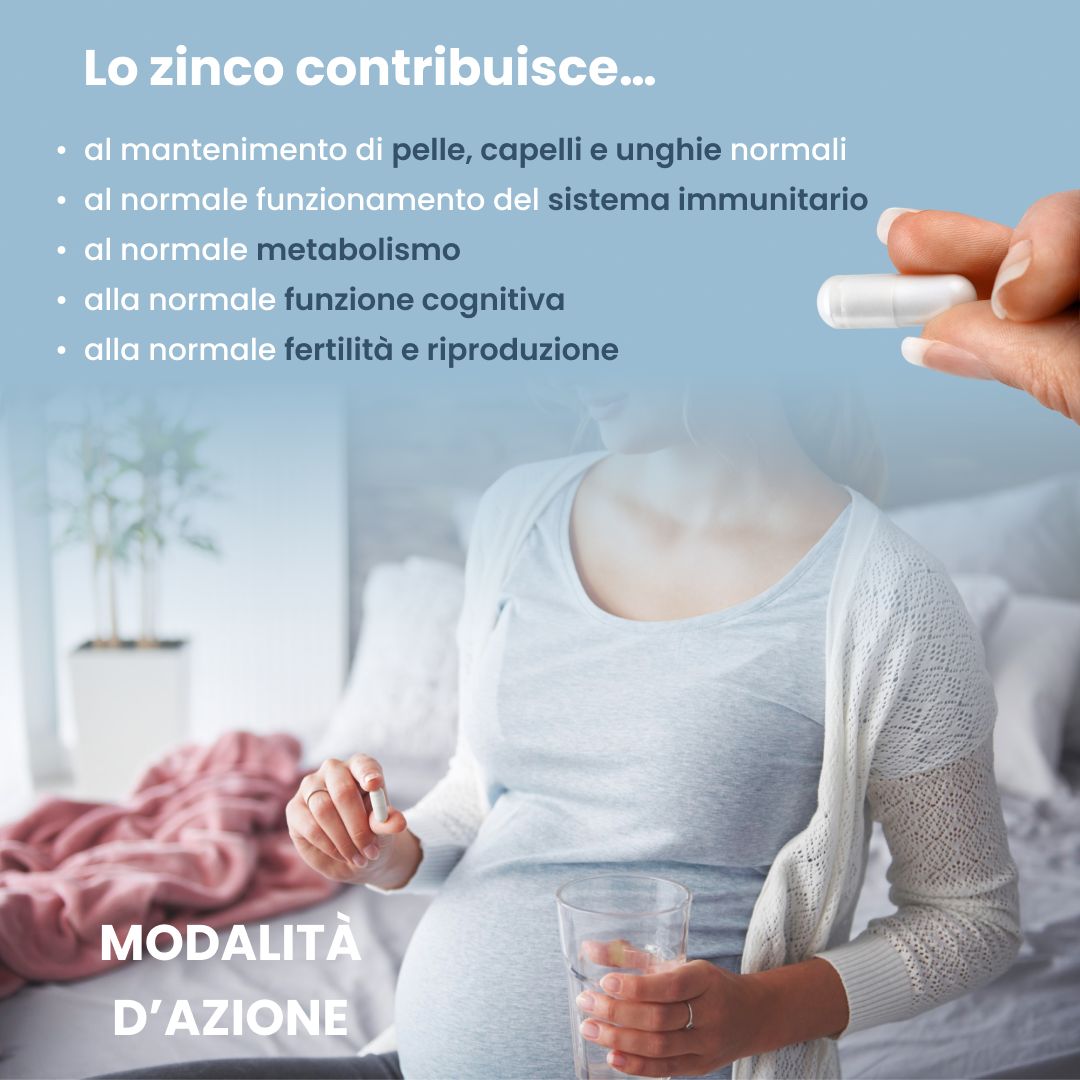 Donna incinta che assume una capsula di zinco.