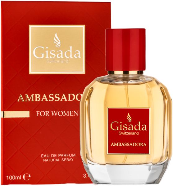 Flacone e confezione rossa. Flacone con tappo rosso ed etichetta "Gisada Ambassadora". Confezione con testo dorato.
