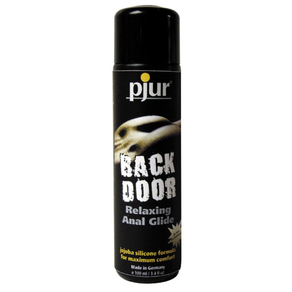 Flacone nero con logo giallo. Scritta: BACK DOOR Relaxing Anal Glide. Con jojoba. Prodotto in Germania.