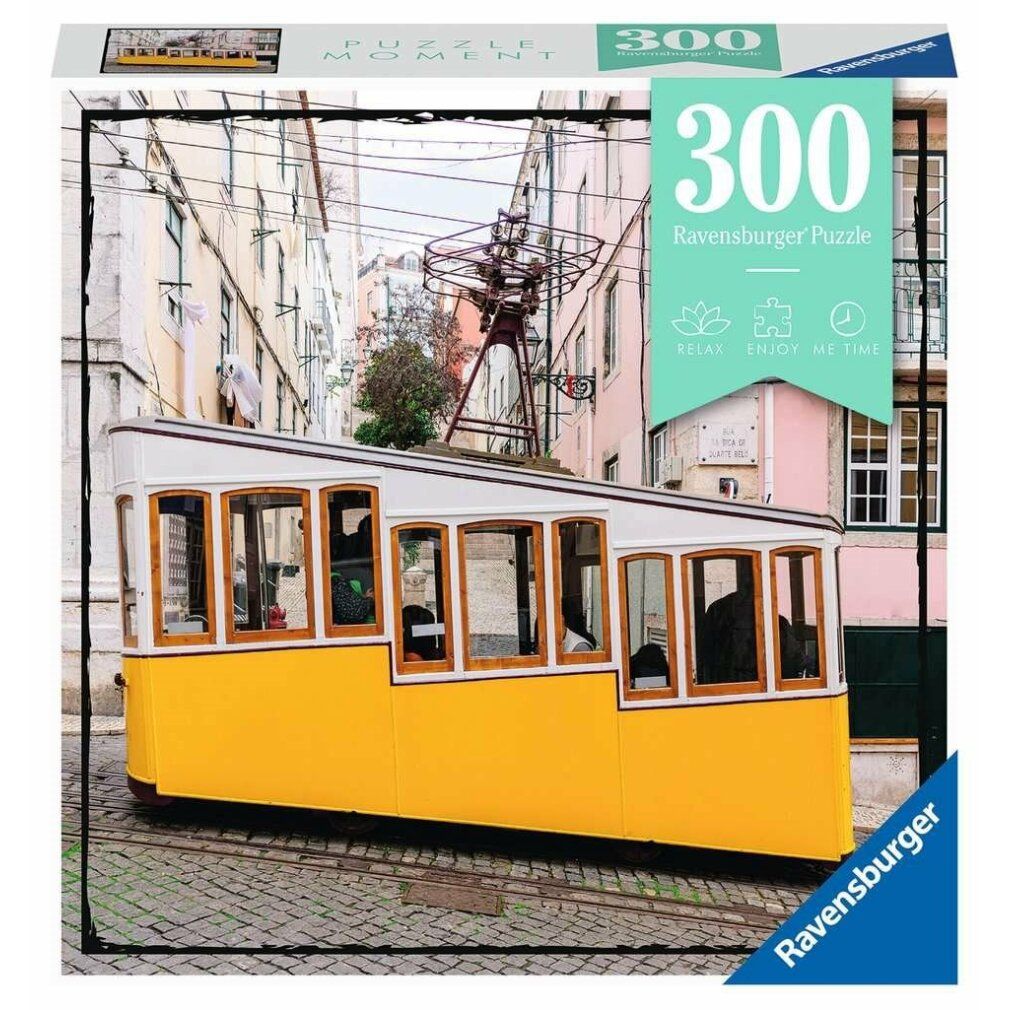 Scatola puzzle con tram giallo davanti alle case. 300 pezzi, Ravensburger. Scritta: Relax, Enjoy Me Time.