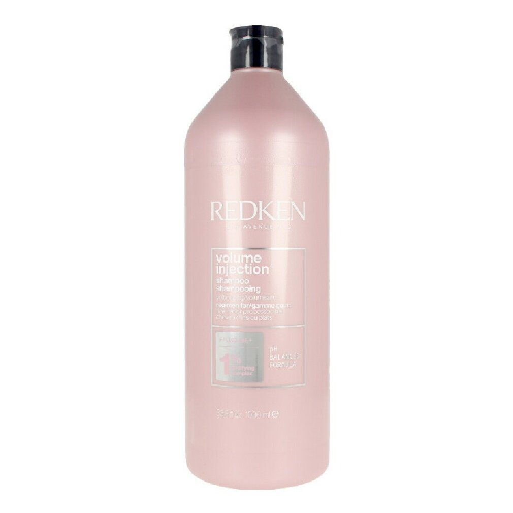 Flacone di shampoo rosa con tappo nero. Scritta: REDKEN, Volume Injection Shampoo. 1000 ml.