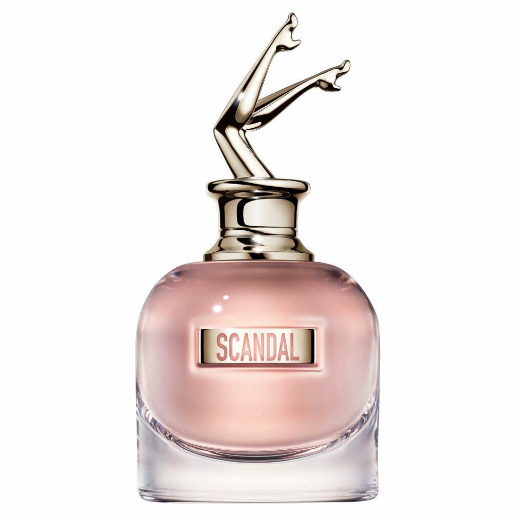 Flacone di profumo. Flacone in vetro con gambe dorate come tappo. Scritto: SCANDAL.
