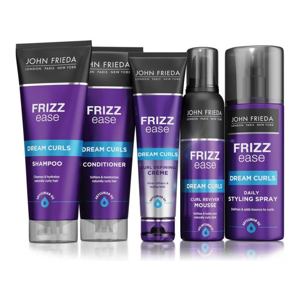 Cinque prodotti John Frieda Frizz Ease: shampoo, balsamo, crema, mousse, spray. Tubi e flaconi viola.