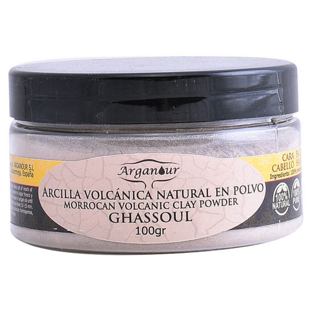 Barattolo di vetro con coperchio nero. Etichetta con nome del prodotto: Argilla Volcanica Natural en Polvo, Ghassoul. 100gr. 100% Natural Pure.