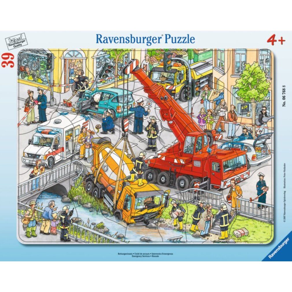 Puzzle con scena di soccorso. Veicoli, pompieri e civili. Logo Ravensburger e raccomandazione d'età 4+.
