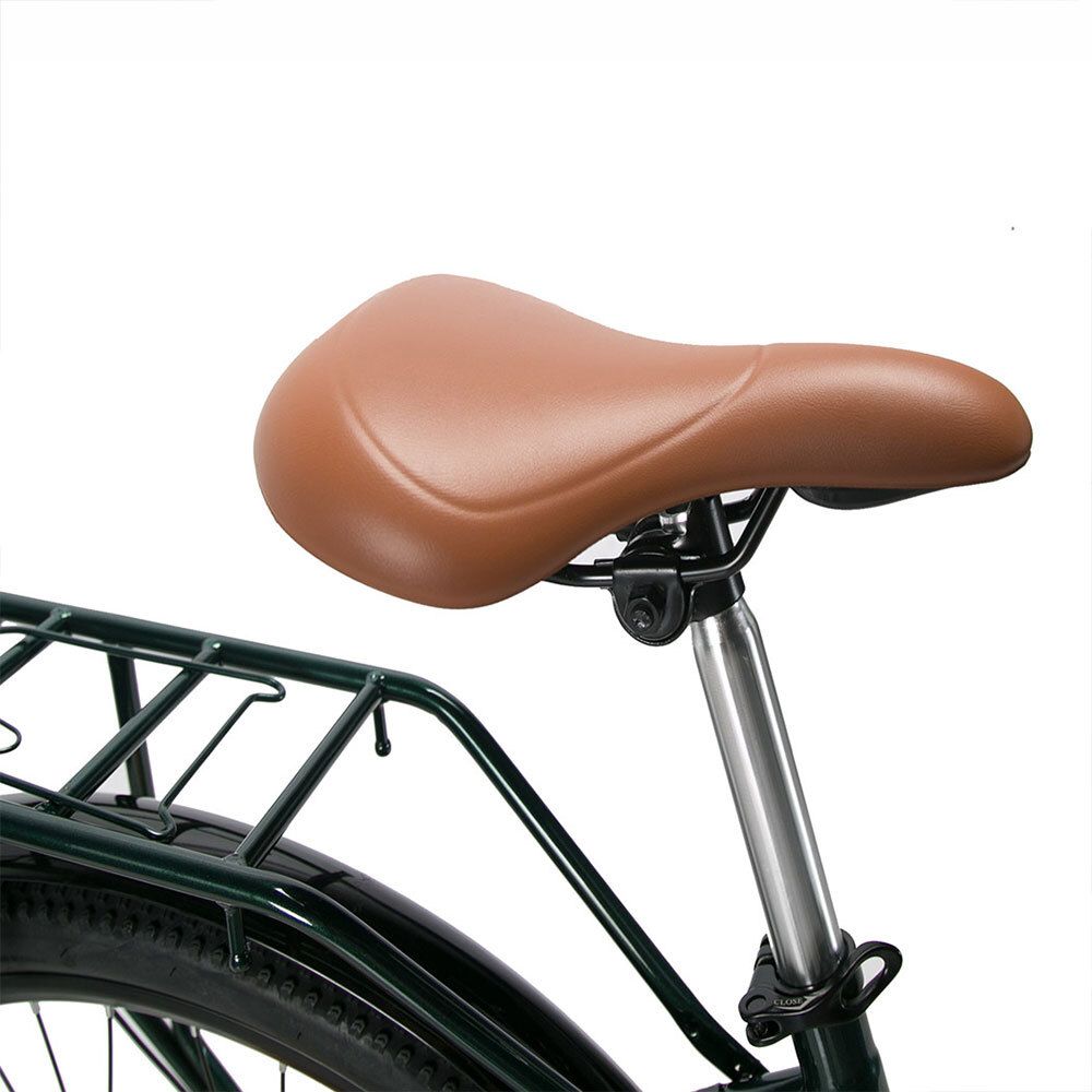 Sella per bicicletta marrone. Reggisella in metallo. Supporto nero. Telaio verniciato verde.