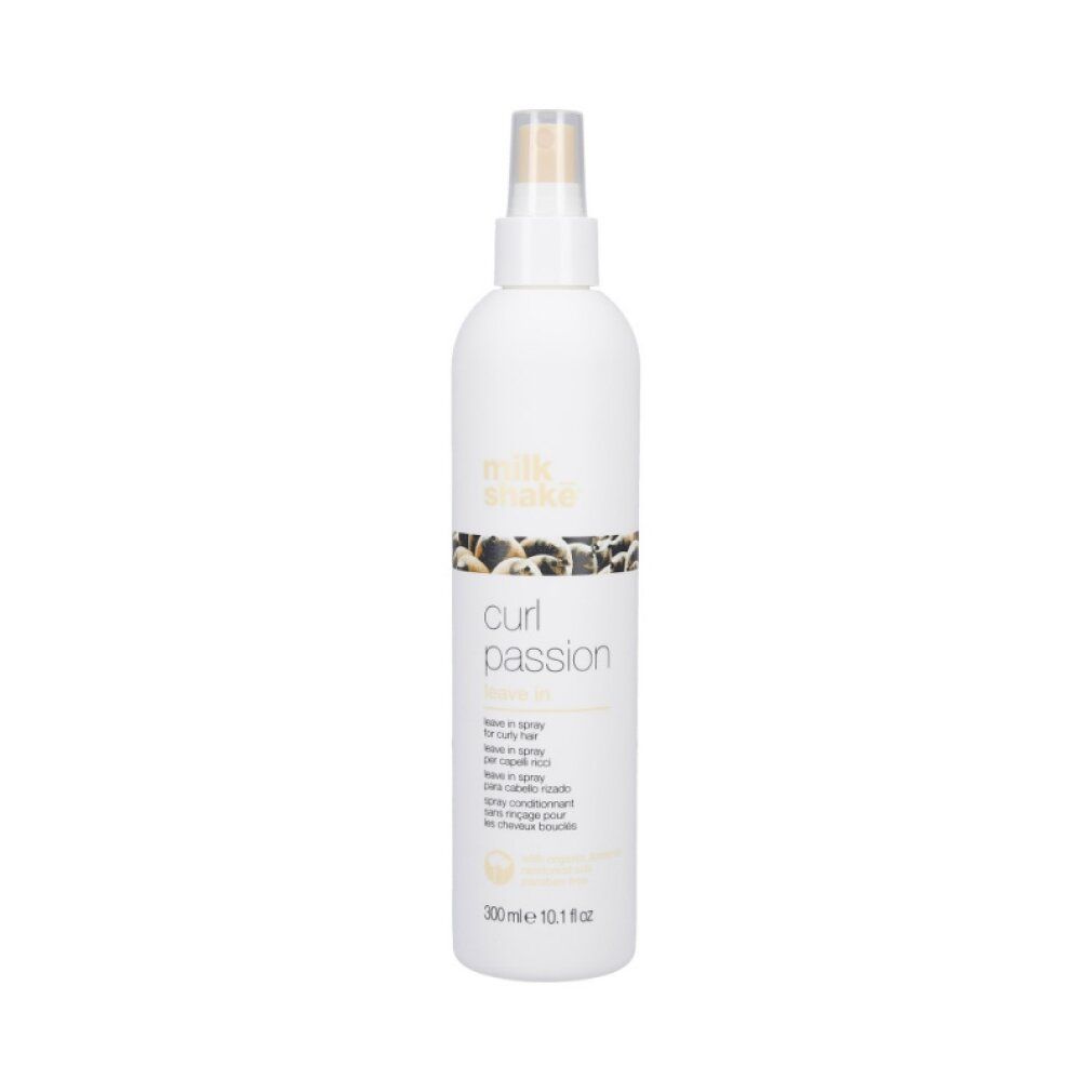 Flacone bianco con vaporizzatore. Scritta: Milk Shake, Curl Passion Leave In. Testo in nero. 300 ml.