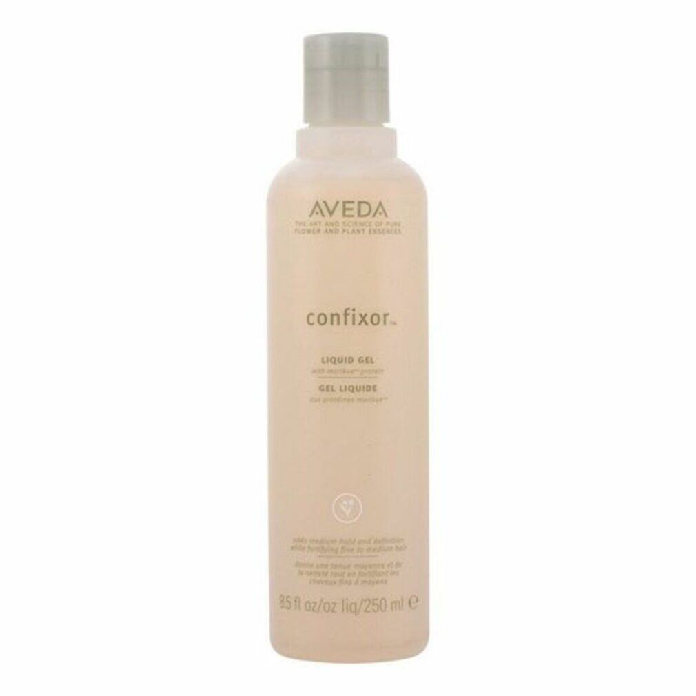 Flacone Aveda Confixor Gel Liquido. Liquido beige, tappo grigio. Scritte: Confixor, Liquid Gel, Gel Liquide.