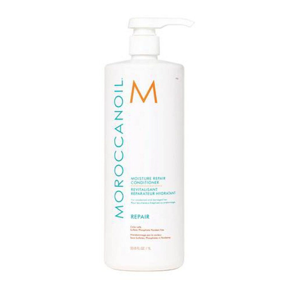 Flacone bianco con dosatore. Scritta: Moroccanoil, logo M, Revitalisant, Repair. Testo in inglese. Adesivo arancione.