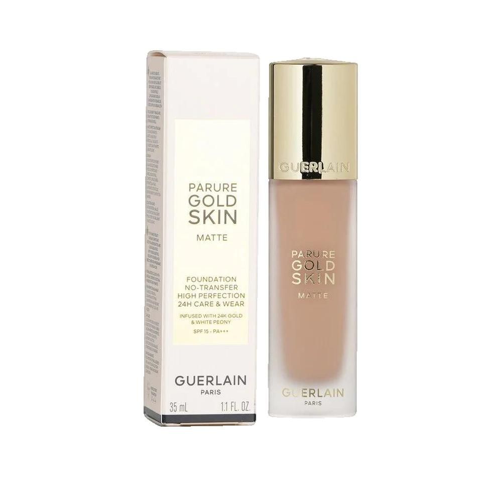 Fondotinta liquido con confezione. Tappo dorato, scritta 'PARURE GOLD SKIN MATTE'. Flacone e scatola con informazioni.