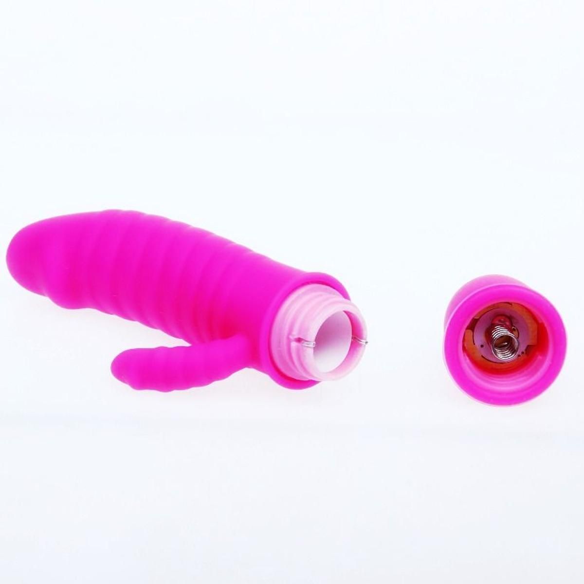 Vibratore rosa smontato. Il vibratore è diviso in due parti.