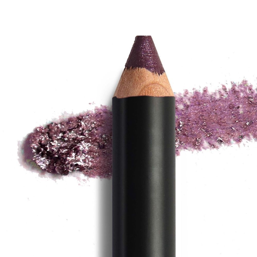 Matita ombretto viola. Matita nera. Traccia di ombretto viola accanto. Aspetto legno.