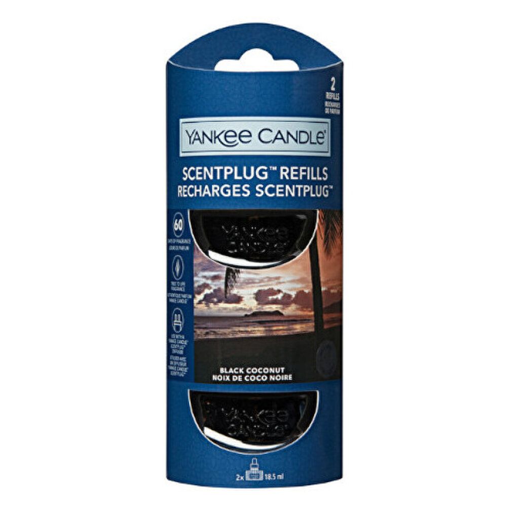 Confezione di ricarica. Due ricariche nere. Testo: Yankee Candle, Scentplug, Black Coconut. 2 x 18,5 ml.