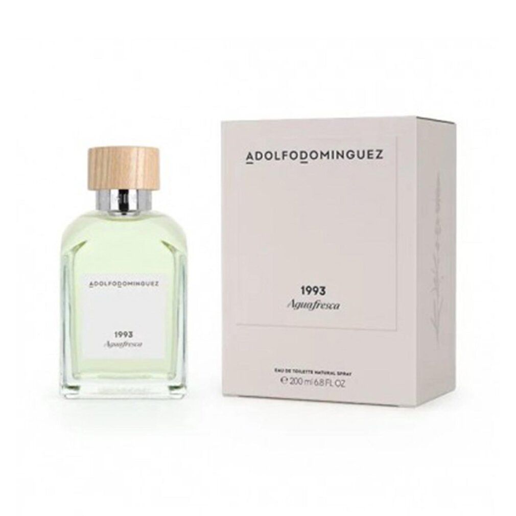 Flacone e confezione di Adolfo Dominguez 1993 Agua Fresca Eau de Toilette. Flacone con tappo in legno, confezione rettangolare con logo.