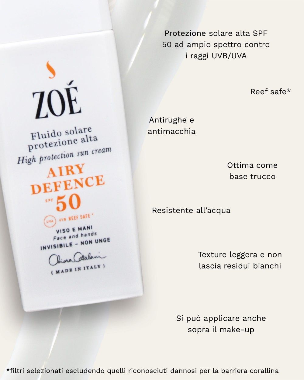 Primo piano del flacone bianco. Testo arancione: AIRY DEFENCE SPF 50. Testo: Fludo solare protezione alta. Marchio: ZOÉ.