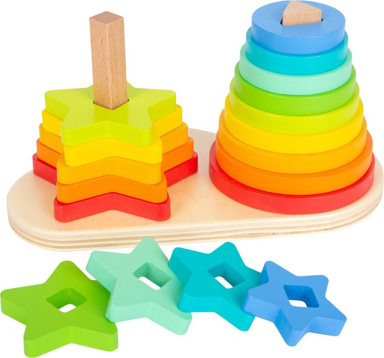 Gioco ad incastro in legno con forme a stella e cerchio arcobaleno. Su base in legno con pioli in legno. Stelle accanto.