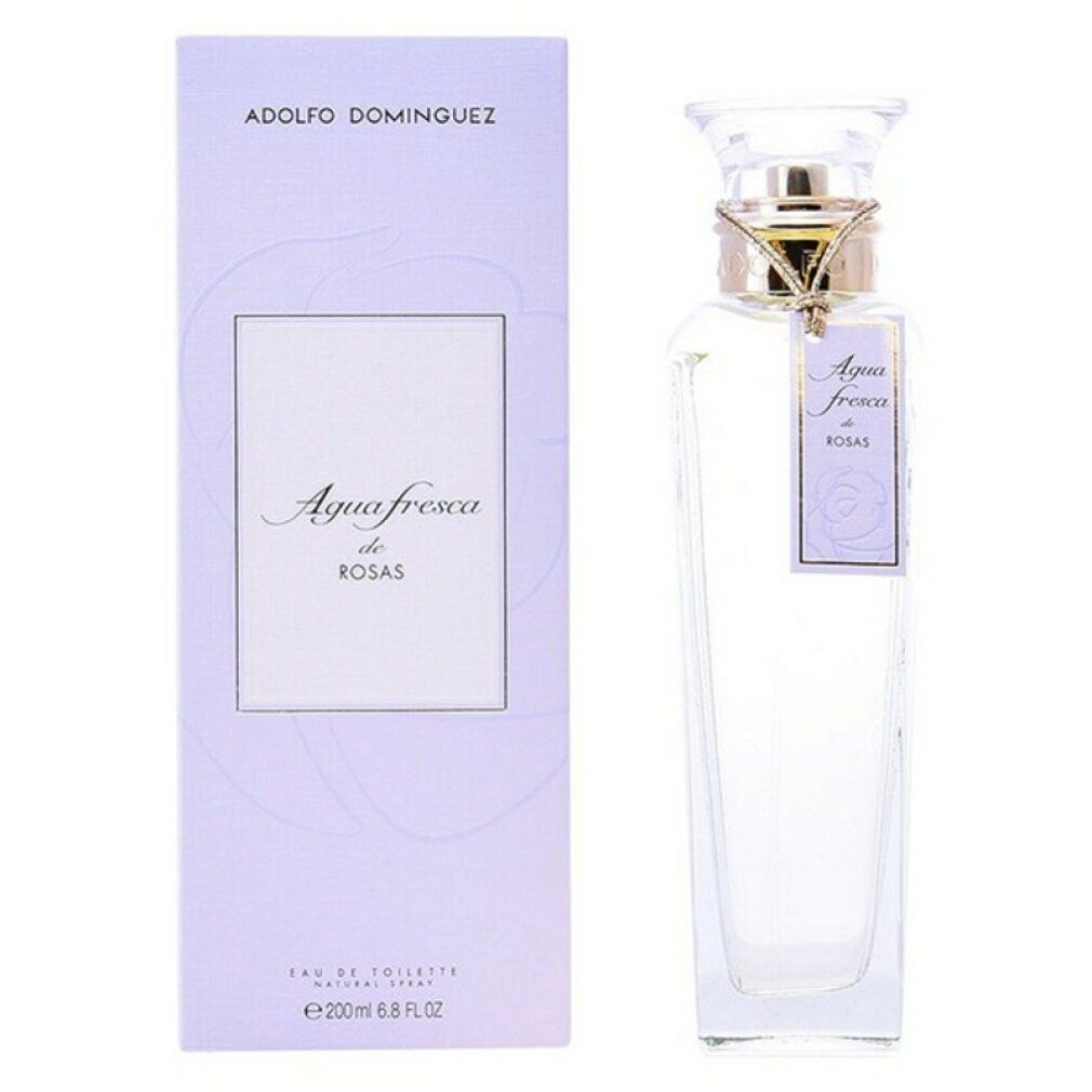 Adolfo Dominguez Agua Fresca de Rosas Eau de Toilette Spray. Flacone e confezione lilla chiaro. Etichetta con nome del prodotto.