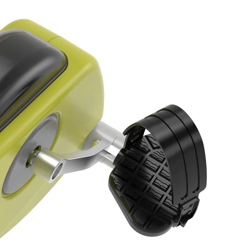 Primo piano del pedale. Pedale nero con cinturino. Alloggiamento giallo. Braccio metallico.