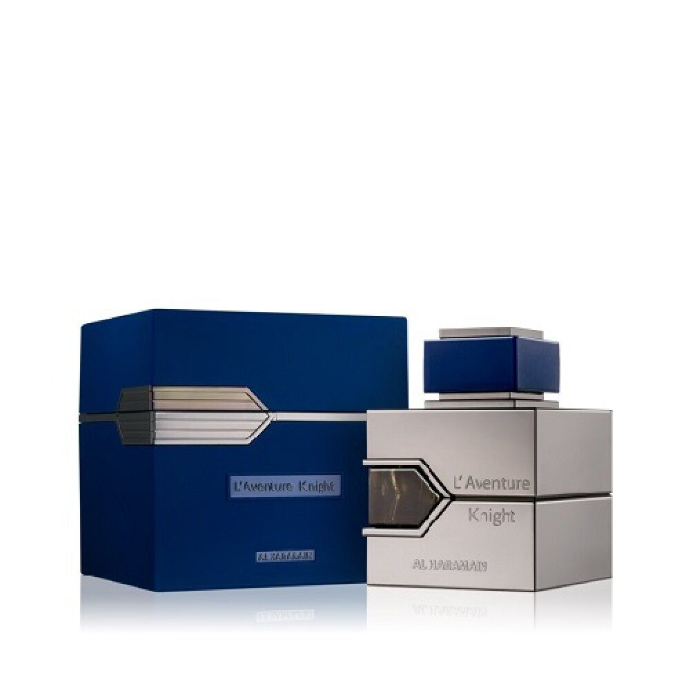 Flacone argento e scatola blu. Scritta: L'Aventure Knight, AL HARAMAIN. Forma rettangolare, dettagli argento.